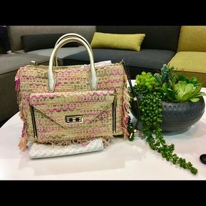 Convertible handbag and clutch by Diane von Furstenberg